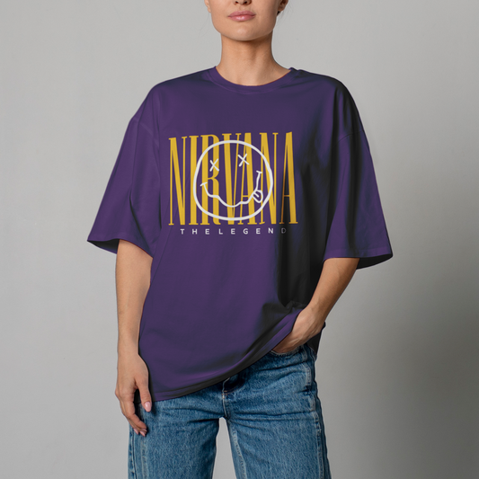 Person wearing a purple t-shirt with 'Nirvana The Legend' graphic design on a gray background